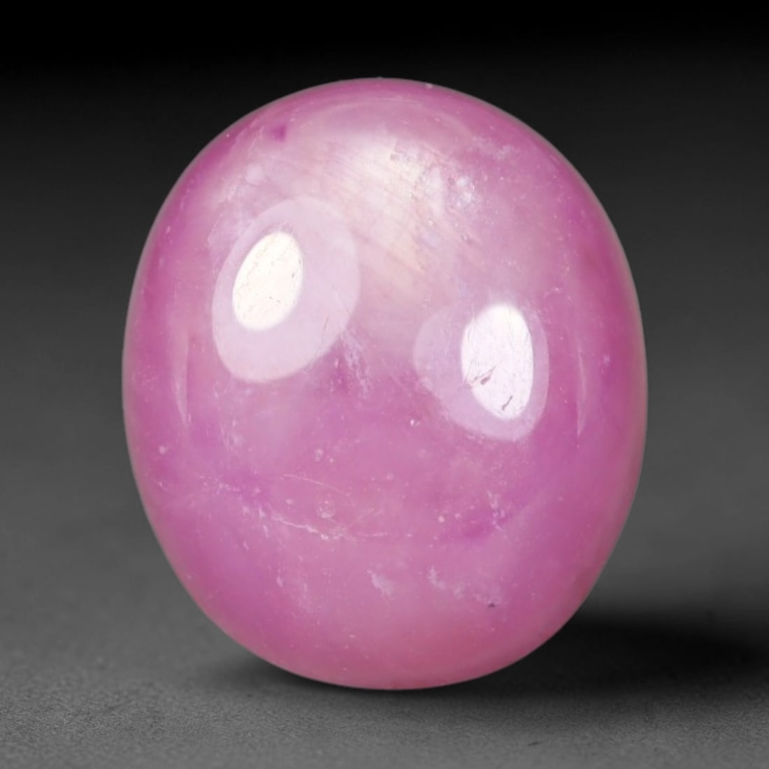 6.37 Carats Natural Madagascar Soft Rose Pink Heated Ruby Cabochon Loose Gemstone, 93AH: This warm blush-toned ruby cabochon carries blended swathes of soft rose pink and gentle peach undertones, with faint natural mineral veining throughout the polished dome, measured at 11.5x10x4.8mm. T