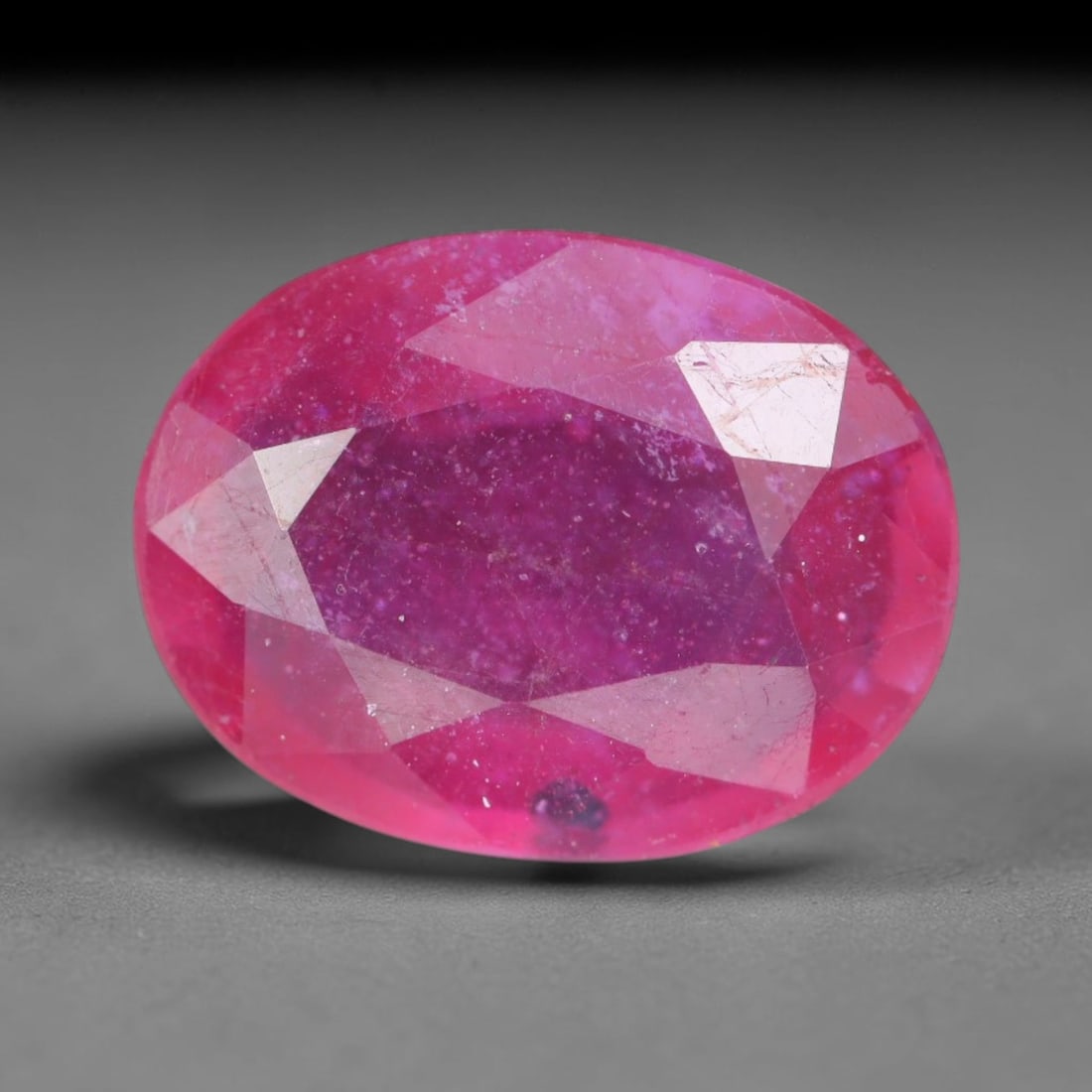 3.67 Carats Natural Madagascar Vivid Magenta Red Ruby Loose Gemstone, 67AH: This vivid magenta-hued Madagascar ruby boasts rich saturated red-pink saturation scattered with tiny fine mineral specks and distinct two-phase fluid bubble inclusions throughout its translucent crys