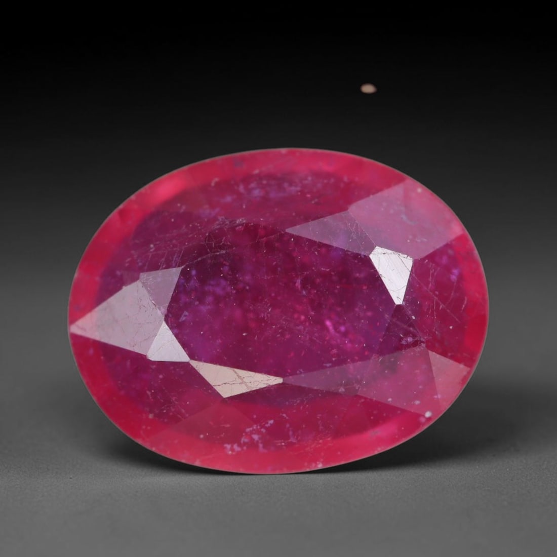 4.51 Carats Natural Madagascar Vivid Magenta Red Ruby Loose Gemstone, 77AH: This vivid magenta-hued Madagascar ruby boasts rich saturated red-pink saturation scattered with tiny fine mineral specks and distinct two-phase fluid bubble inclusions throughout its translucent crys