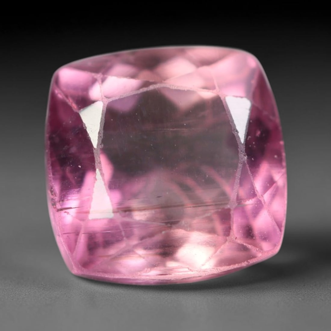 2.41 Carats Natural Mozambique Pink Tourmaline Loose Gemstone, 18AK: This transparent Mozambique tourmaline carries gentle pink saturation, marked by fine natural linear internal fissures and subtle micro specks throughout the crystal structure, measured at 7.6x7.6x5mm