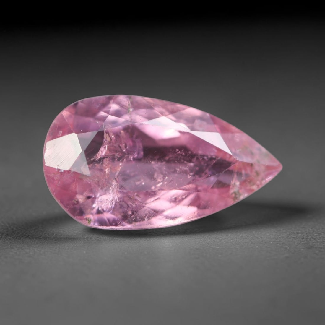 1.76 Carats Natural Mozambique Soft Pink Tourmaline Loose Gemstone, 27AK: This transparent Mozambique tourmaline carries gentle pastel pink saturation, interspersed with thin native linear mineral inclusions and faint natural internal fissures across the crystal interior, m
