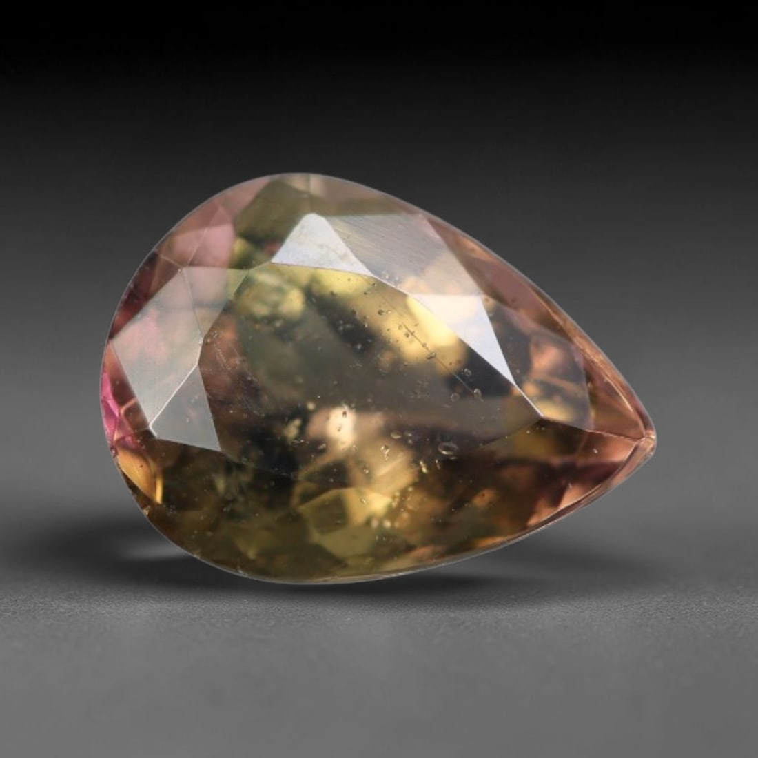 0.80 Carats Natural Mozambique Bi-Color Pink Champagne Tourmaline Loose Gemstone, 51AK: This transparent Mozambique bi-color tourmaline features natural zoning blending soft pink and warm champagne tones, dotted with tiny native mineral specks and faint subtle internal fractures througho
