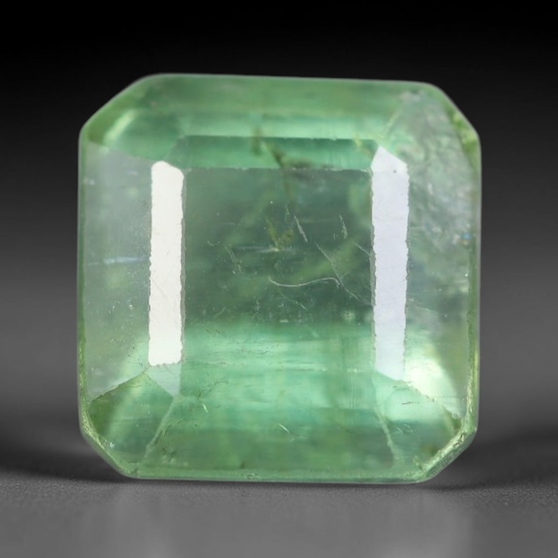 1.91 Carats Natural Mozambique Sage Green Tourmaline Loose Gemstone, 26AK: This transparent Mozambique tourmaline displays a delicate light sage green shade, featuring subtle natural fine fissures and scattered tiny mineral micro-inclusions within its crystal matrix, measure