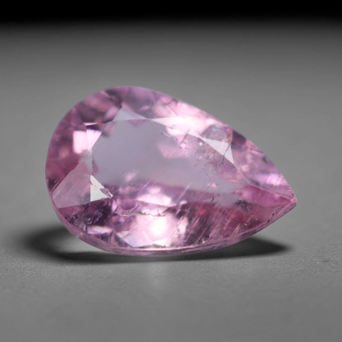 1.91 Carats Natural Mozambique Soft Pink Tourmaline Loose Gemstone, 30AK: This transparent Mozambique tourmaline carries gentle pastel pink saturation, interspersed with thin native linear mineral inclusions and faint natural internal fissures across the crystal interior, m