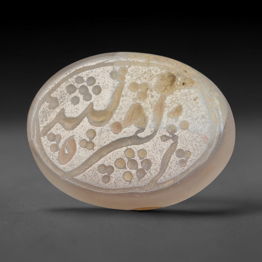 Antique Islamic Qajar / Late Ottoman Agate Calligraphic Talisman Seal (1700-1900 CE), 100AL: Genuine fully hand-carved oval agate seal, entirely crafted by hand without machine tooling, identifiable by organic, uneven hand-cut engraving texture throughout the calligraphic field. The stone bea