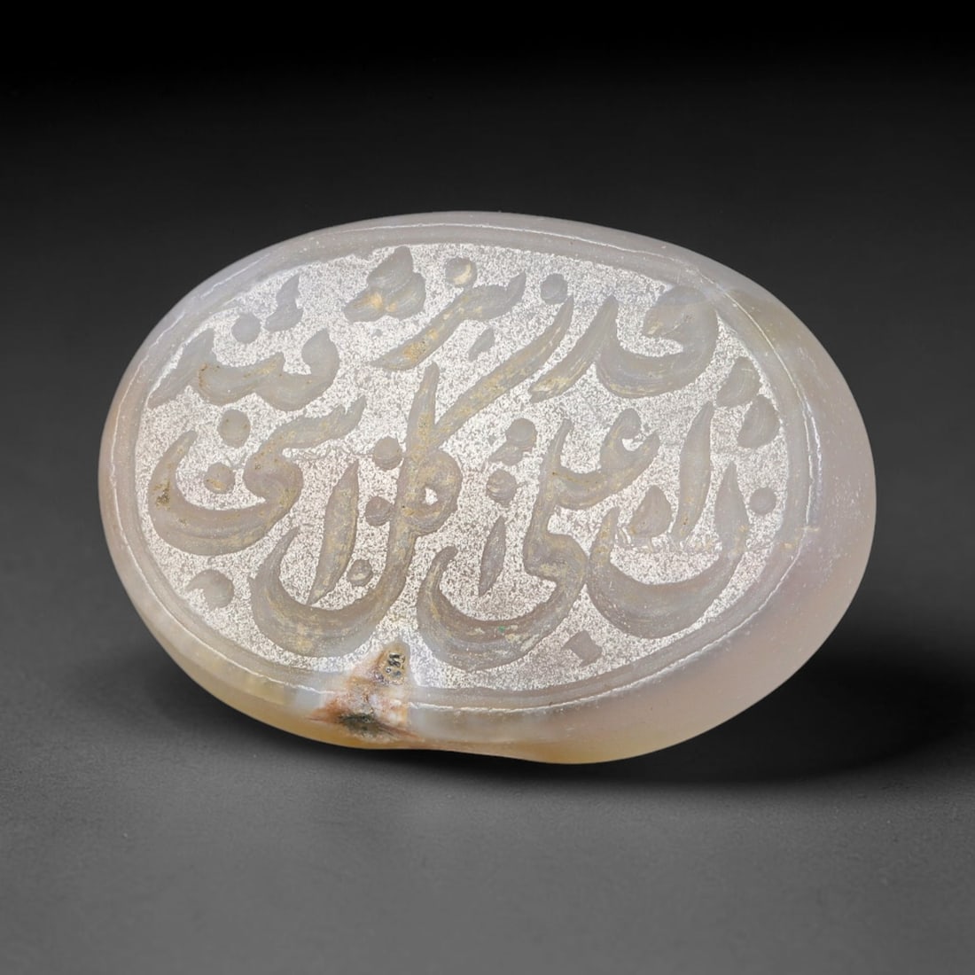 Antique Islamic Qajar / Late Ottoman Agate Calligraphic Talisman Seal (1700-1900 CE), 81AL: Genuine fully hand-carved oval agate seal, entirely crafted by hand without machine tooling, identifiable by organic, uneven hand-cut engraving texture throughout the calligraphic field. The stone bea