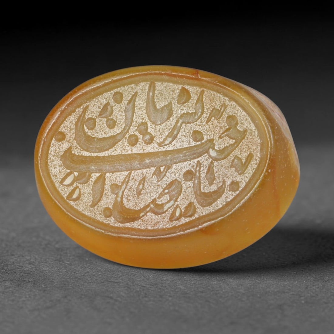 Antique Islamic Qajar / Late Ottoman Agate Calligraphic Talisman Seal (1700-1900 CE), 97AL: Genuine fully hand-carved oval agate seal, entirely crafted by hand without machine tooling, identifiable by organic, uneven hand-cut engraving texture throughout the calligraphic field. The stone bea