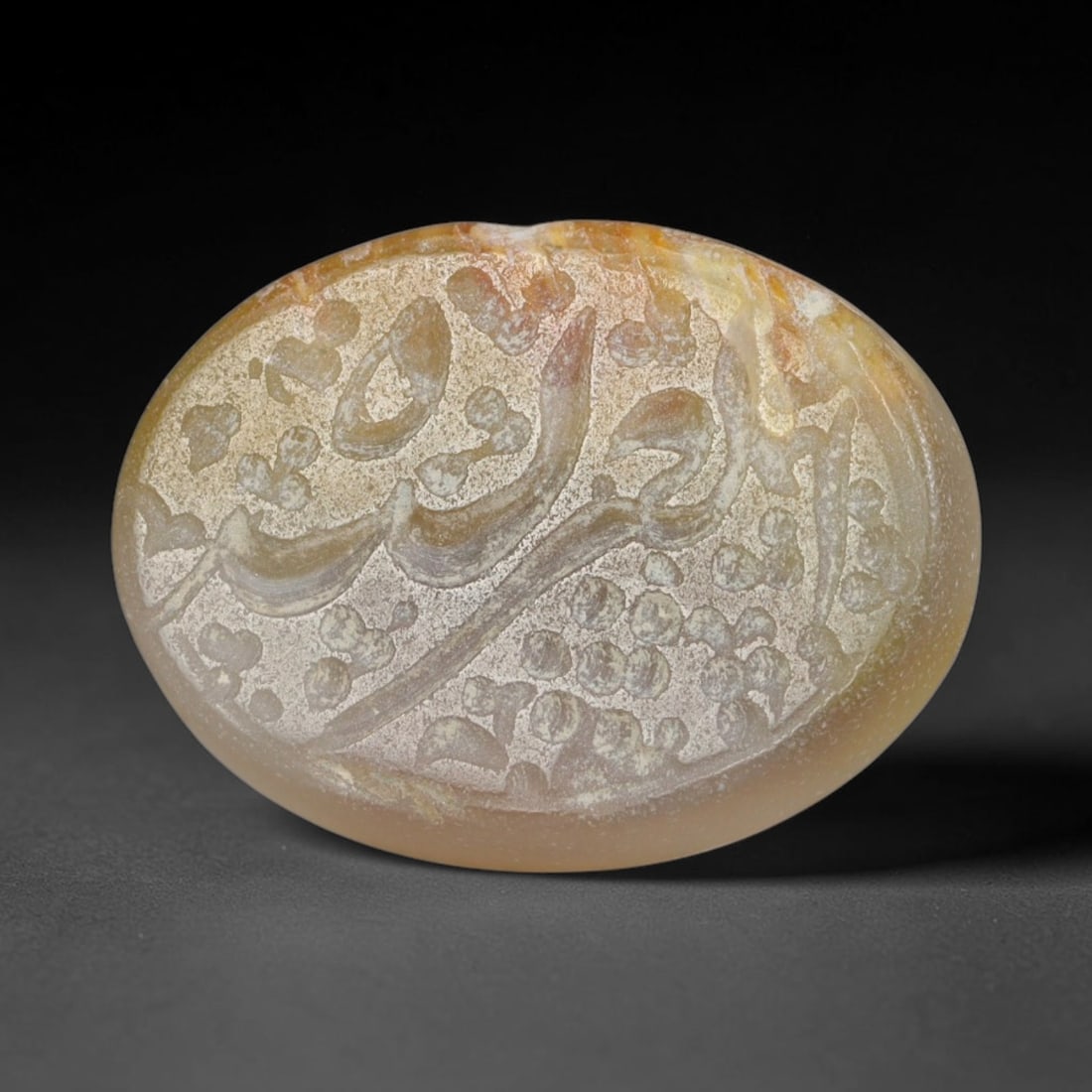 Antique Islamic Qajar / Late Ottoman Agate Calligraphic Talisman Seal (1700-1900 CE), 2AM: Genuine fully hand-carved oval agate seal, entirely crafted by hand without machine tooling, identifiable by organic, uneven hand-cut engraving texture throughout the calligraphic field. The stone bea