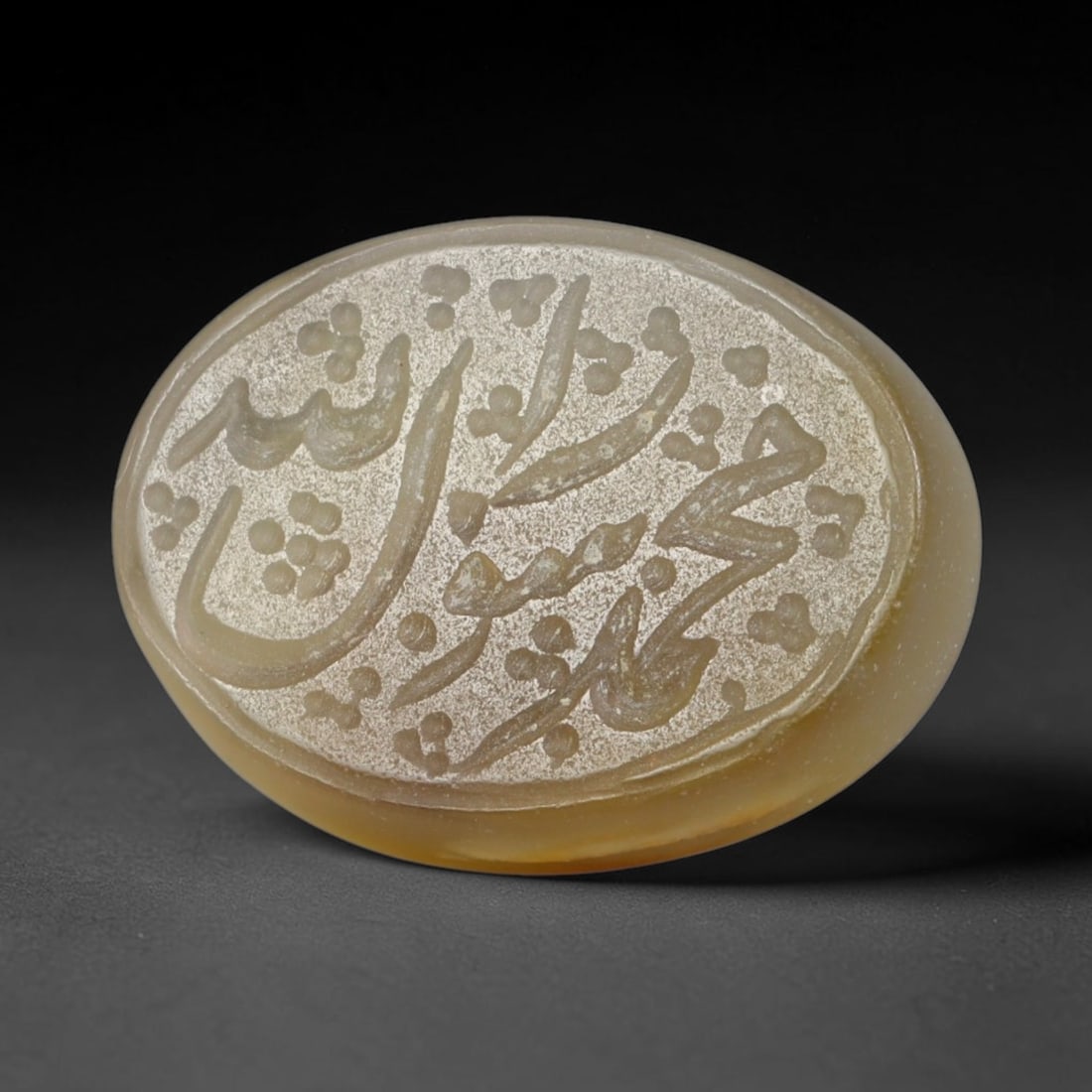 Antique Islamic Qajar / Late Ottoman Agate Calligraphic Talisman Seal (1700-1900 CE), 1AM: Genuine fully hand-carved oval agate seal, entirely crafted by hand without machine tooling, identifiable by organic, uneven hand-cut engraving texture throughout the calligraphic field. The stone bea
