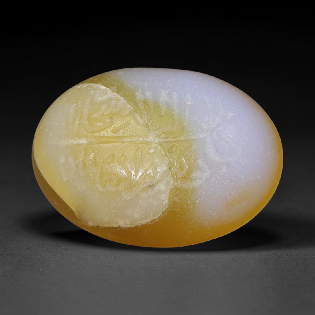 Antique Islamic Qajar / Late Ottoman Agate Calligraphic Talisman Seal (1700-1900 CE), 5AM: Genuine fully hand-carved oval agate seal, entirely crafted by hand without machine tooling, identifiable by organic, uneven hand-cut engraving texture throughout the calligraphic field. The stone bea
