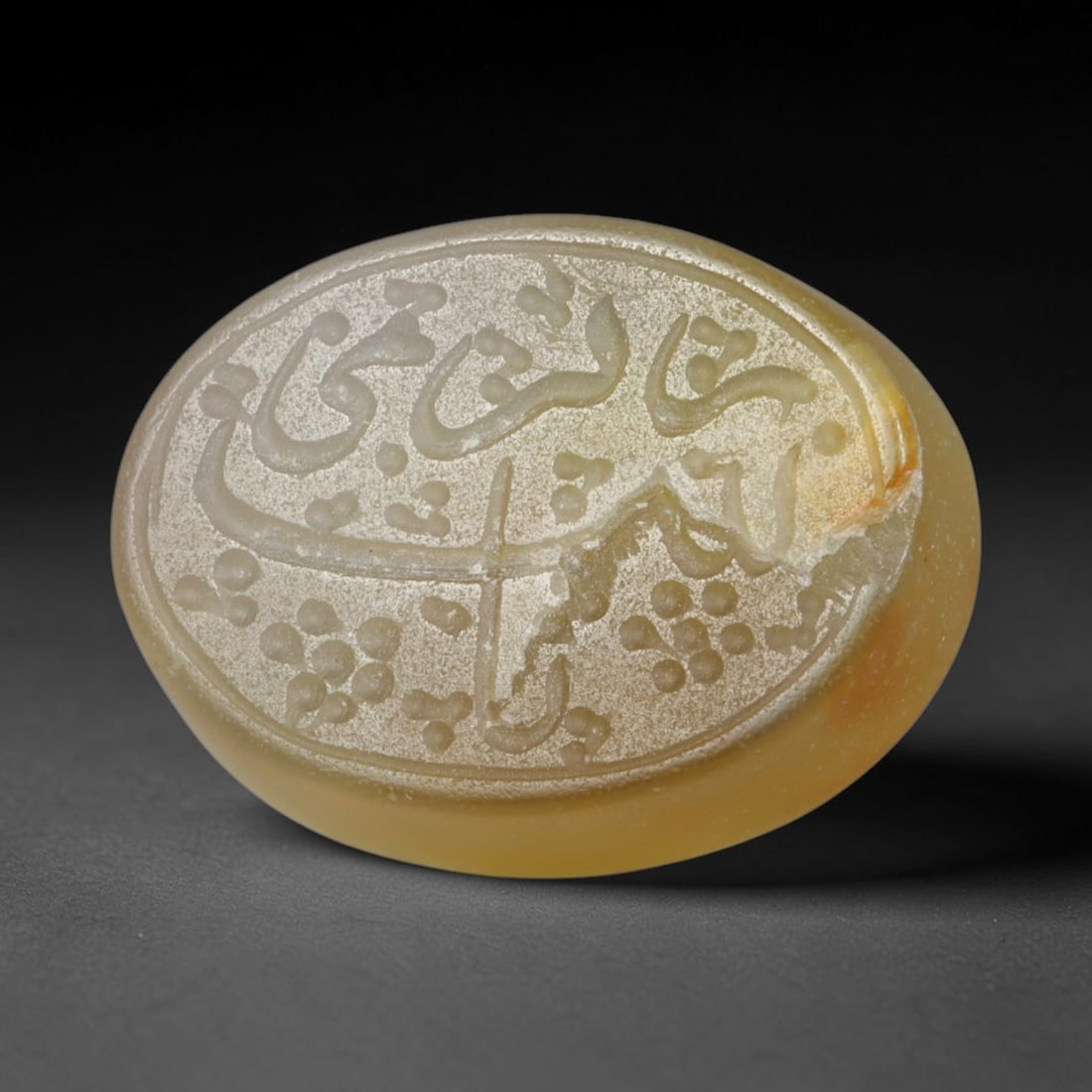 Antique Islamic Qajar / Late Ottoman Agate Calligraphic Talisman Seal (1700-1900 CE), 93AL: Genuine fully hand-carved oval agate seal, entirely crafted by hand without machine tooling, identifiable by organic, uneven hand-cut engraving texture throughout the calligraphic field. The stone bea