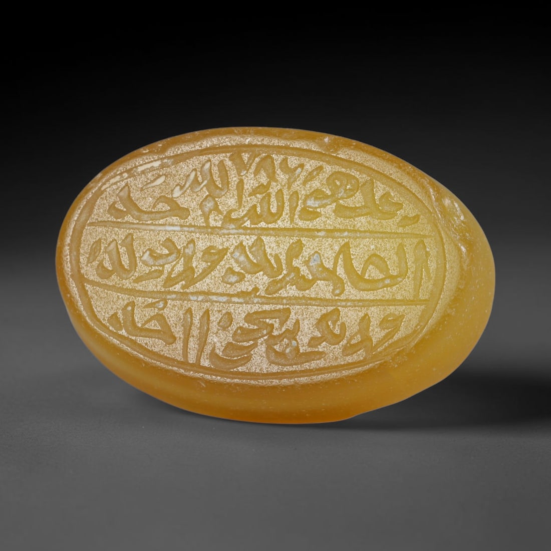 Antique Islamic Qajar / Late Ottoman Agate Calligraphic Talisman Seal (1700-1900 CE), 87AL: Genuine fully hand-carved oval agate seal, entirely crafted by hand without machine tooling, identifiable by organic, uneven hand-cut engraving texture throughout the calligraphic field. The stone bea