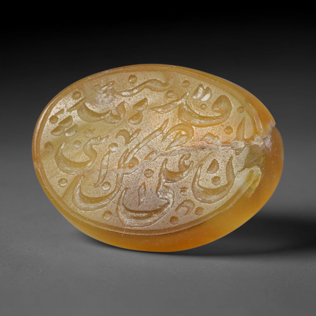 Antique Islamic Qajar / Late Ottoman Agate Calligraphic Talisman Seal (1700-1900 CE), 92AL: Genuine fully hand-carved oval agate seal, entirely crafted by hand without machine tooling, identifiable by organic, uneven hand-cut engraving texture throughout the calligraphic field. The stone bea