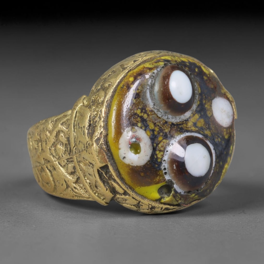 Antique Islamic Millefiori Evil Eye Glass Cabochon Set Vintage Signet Ring (1700-1900 CE), 57AM: The primary collectible value resides within the inset antique millefiori evil-eye glass cabochon, authentic genuine antique glass (distinguished from earlier ancient glass and modern vintage glass) c
