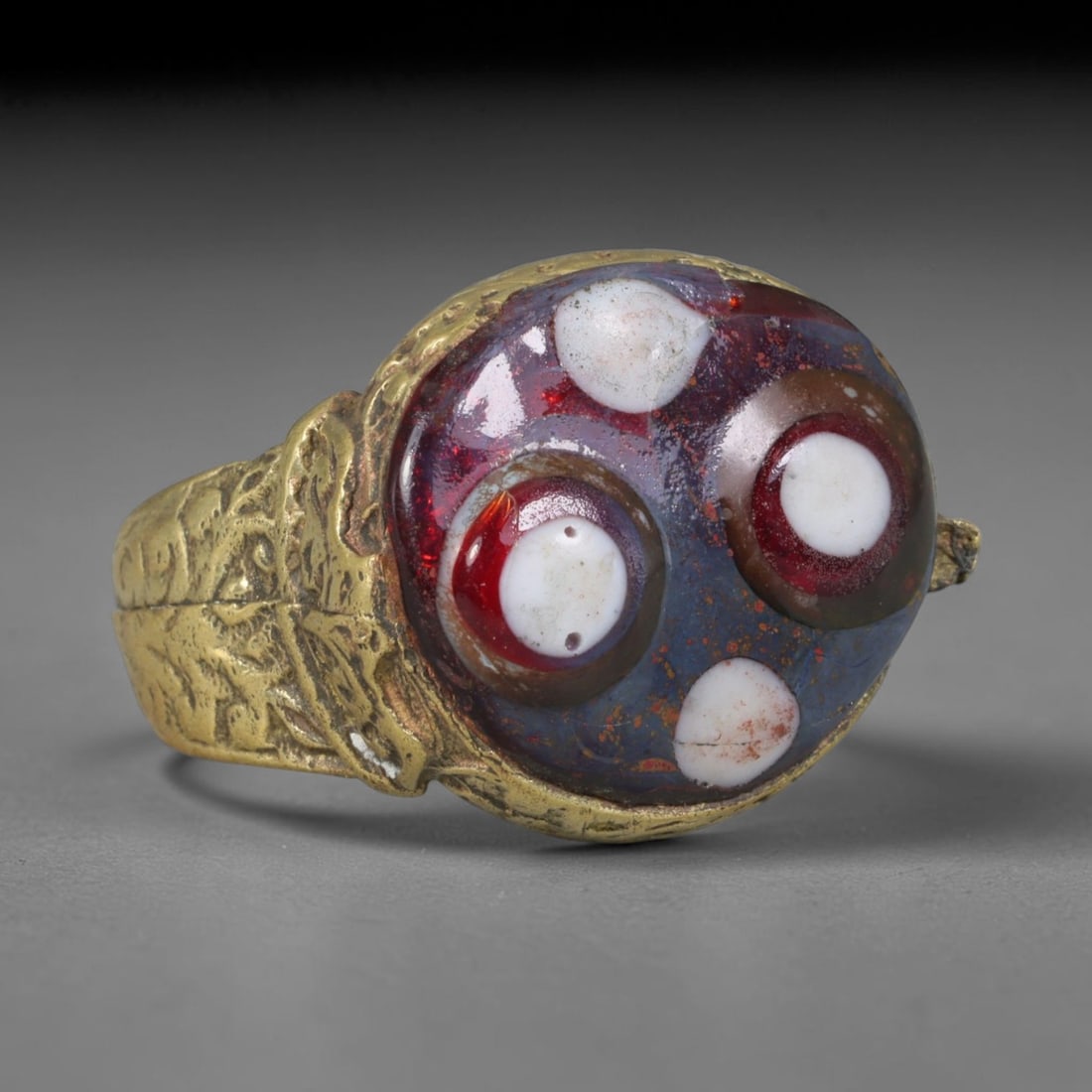 Antique Islamic Millefiori Evil Eye Glass Cabochon Set Vintage Signet Ring (1700-1900 CE), 94AM: The primary collectible value resides within the inset antique millefiori evil-eye glass cabochon, authentic genuine antique glass (distinguished from earlier ancient glass and modern vintage glass) c
