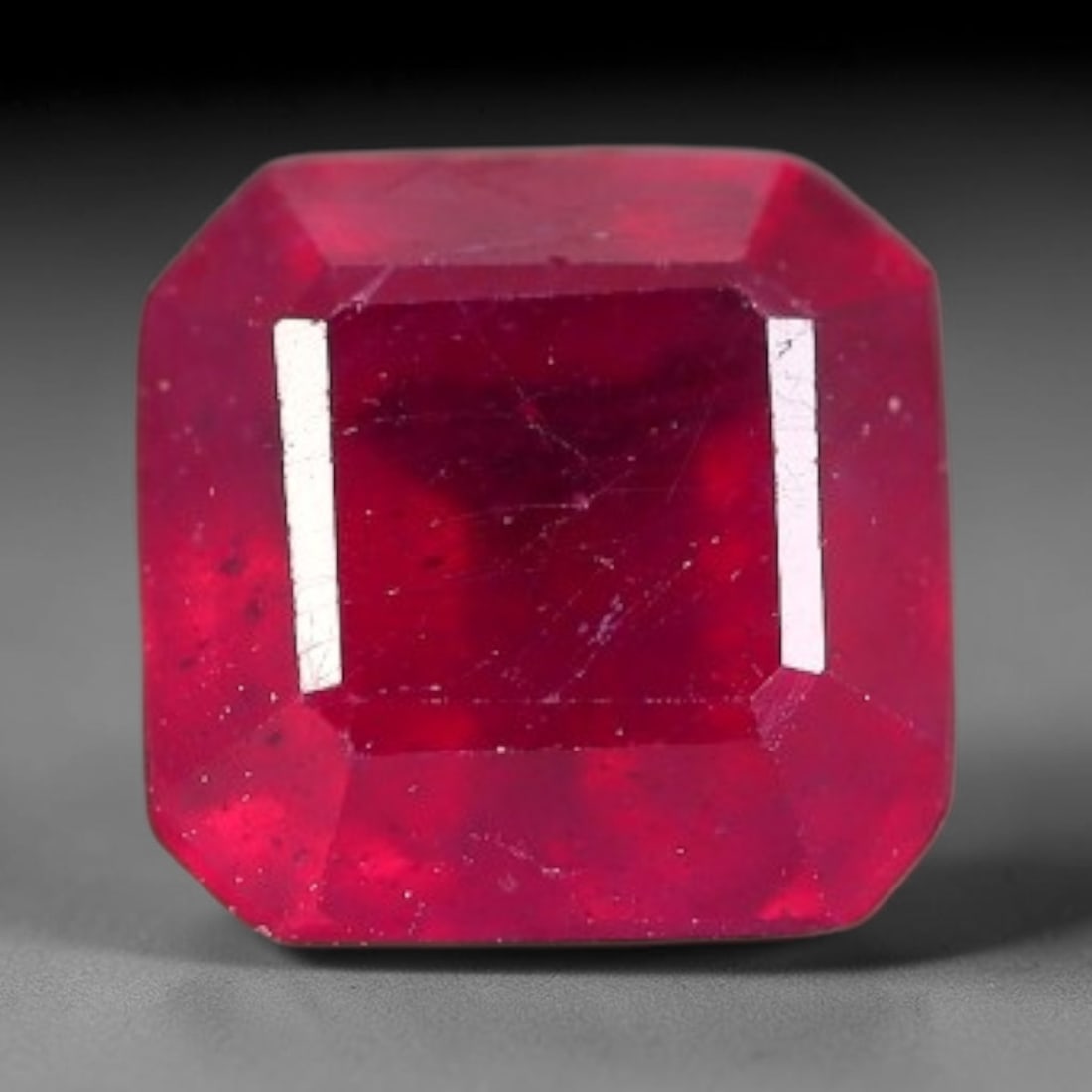 1.64 Carats Natural Madagascar Vivid Fuchsia Red Heated Ruby Loose Gemstone, 26FM: This vivid fuchsia red Madagascar ruby displays rich saturated red tone with subtle natural internal mineral traces that showcase genuine earth-grown character, measured at 6.1x4.1mm, the intense warm