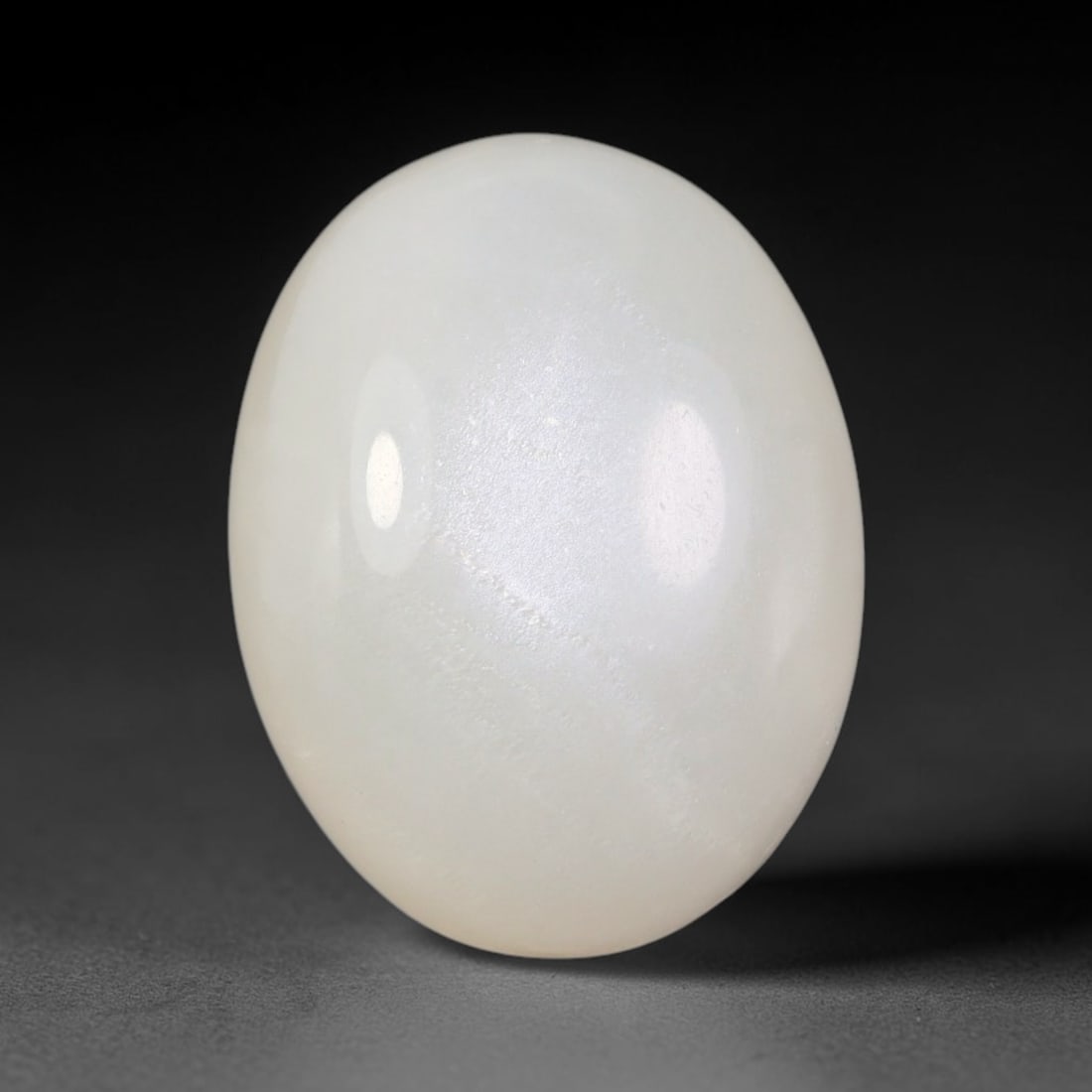 14.11 Carats Natural Ceylon Soft Milky White Moonstone Loose Gemstone, 71FE: This natural Ceylon moonstone carries a smooth milky white base with subtle gentle adularescent glow across its polished surface, measured at 17.5x13.4x7.8mm, showcasing clean even transparency with m