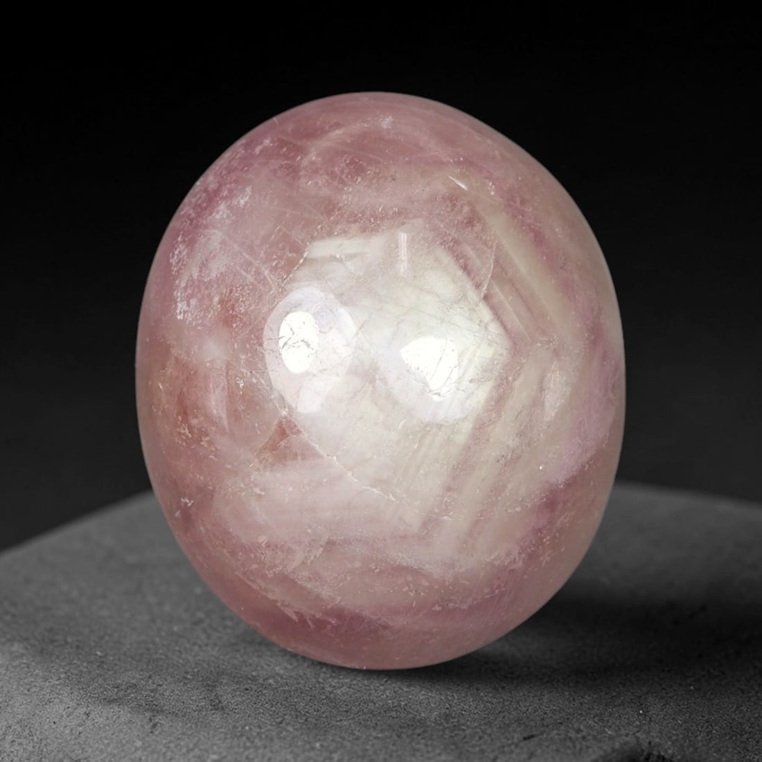17.54 Carats Natural Madagascar Soft Rose Pink Heated Ruby Cabochon Loose Gemstone, 48FE: This warm blush-toned ruby cabochon carries blended swathes of soft rose pink and gentle peach undertones, with faint natural mineral veining throughout the polished dome, measured at 15.8x14x8mm. The