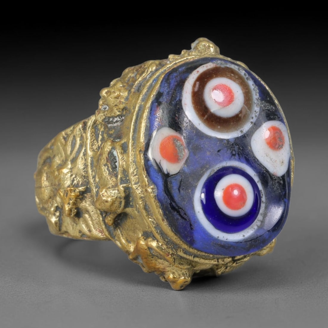 Antique Islamic Millefiori Evil Eye Glass Cabochon Set Vintage Signet Ring (1700-1900 CE), 69AM: The primary collectible value resides within the inset antique millefiori evil-eye glass cabochon, authentic genuine antique glass (distinguished from earlier ancient glass and modern vintage glass) c