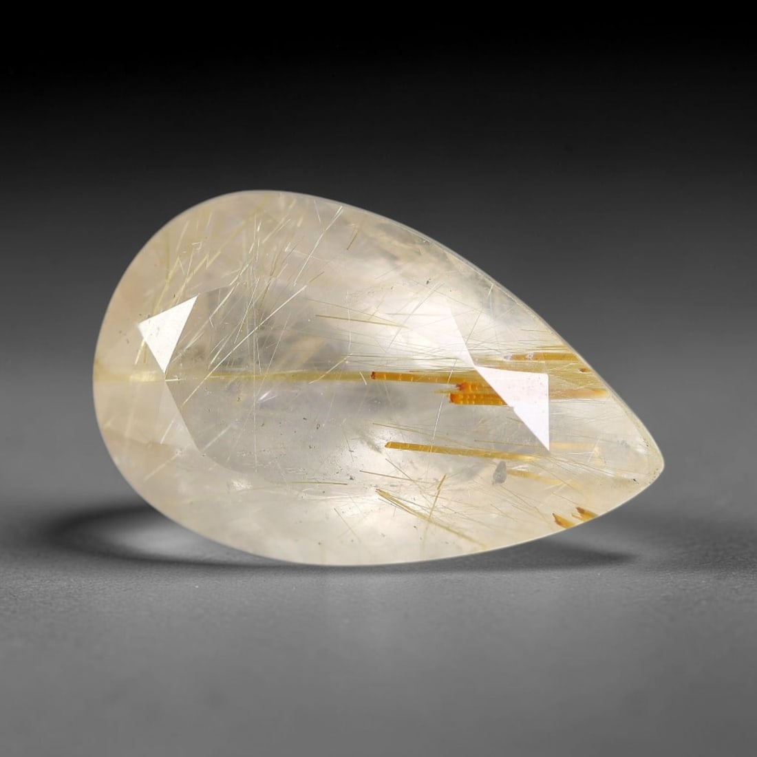 6.97 Carats Natural Brazil Golden Needle Rutile Quartz Loose Gemstone, 59FG: This natural Brazil golden needle rutile quartz facet carries dimension readings of 16.6x10.3x7.4mm, filled with dense thin copper-gold rutile needle inclusions that stretch horizontally across the tr