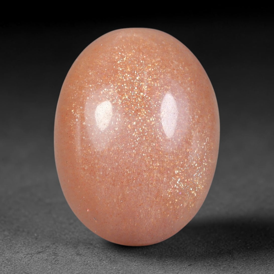 24.55 Carats Natural Ceylon Warm Peach Moonstone Loose Gemstone, 93FE: This natural Ceylon moonstone has dimension measurements of 24.1x18.4x8mm, showcasing a smooth warm peach base tone paired with subtle soft adularescent sheen that glides gently across the polished su