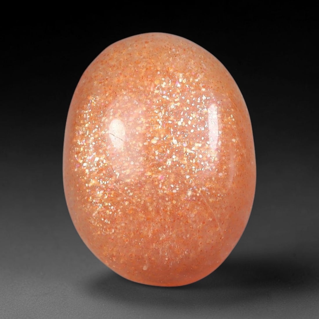 9.23 Carats Natural Ceylon Warm Peach Moonstone Loose Gemstone, 83FE: This natural Ceylon moonstone has dimension measurements of 17.1x13.1x5.8mm, showcasing a smooth warm peach base tone paired with subtle soft adularescent sheen that glides gently across the polished 