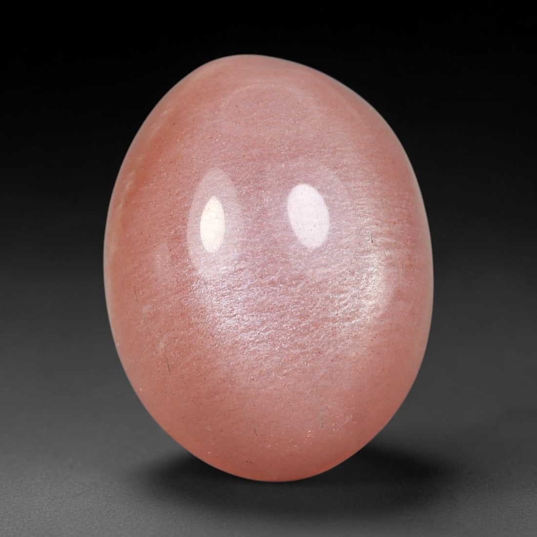 15.88 Carats Natural Ceylon Warm Peach Moonstone Loose Gemstone, 78FE: This natural Ceylon moonstone has dimension measurements of 19.4x14.7x7.7mm, showcasing a smooth warm peach base tone paired with subtle soft adularescent sheen that glides gently across the polished 
