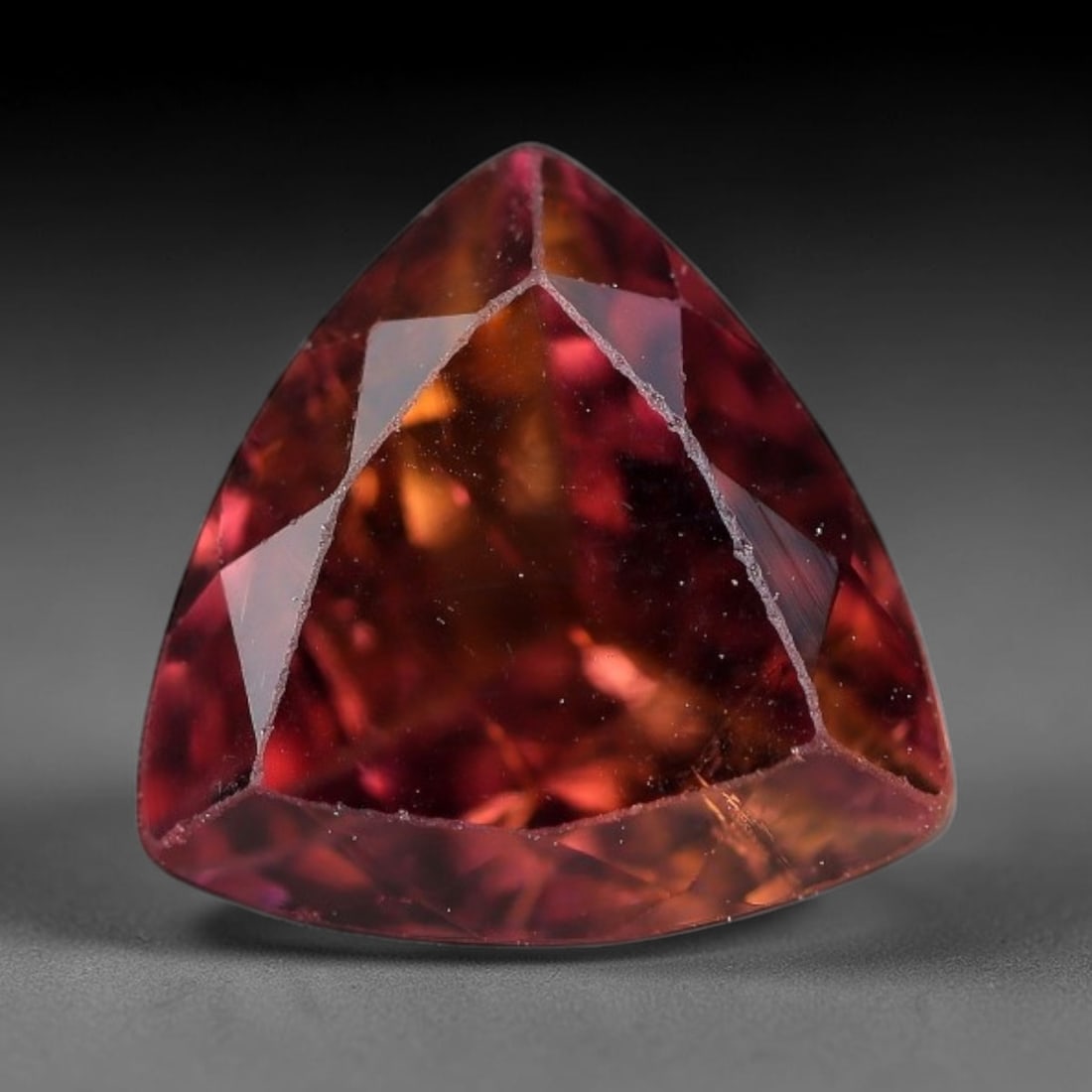 3.06 Carats Natural Mozambique Multi-Tone Rubellite Tourmaline Loose Gemstone, 71FM: This natural Mozambique rubellite tourmaline measures 9x5.9mm, featuring an attractive blend of deep red and warm amber orange hues spread evenly throughout its transparent crystal, with tiny microsco