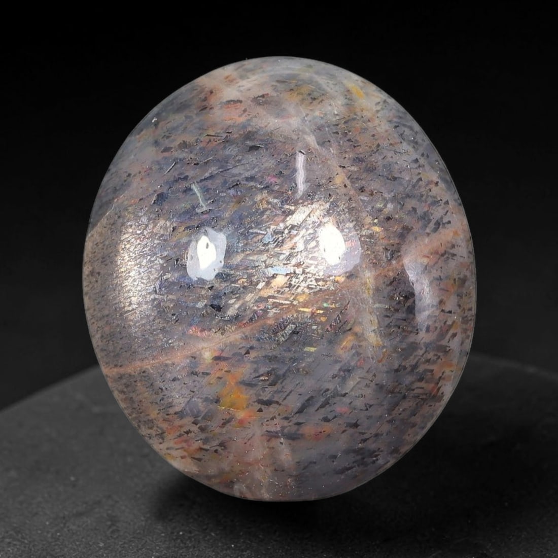27.23 Carats Natural Australian Lattice Sunstone Cabochon Loose Gemstone, 88AB: This rich lattice sunstone boasts striking vertical mineral lattice inclusions, measured at 22x19.4x9.4mm, its earthy blended brown and peach base paired with vibrant multi-colored light reflections d
