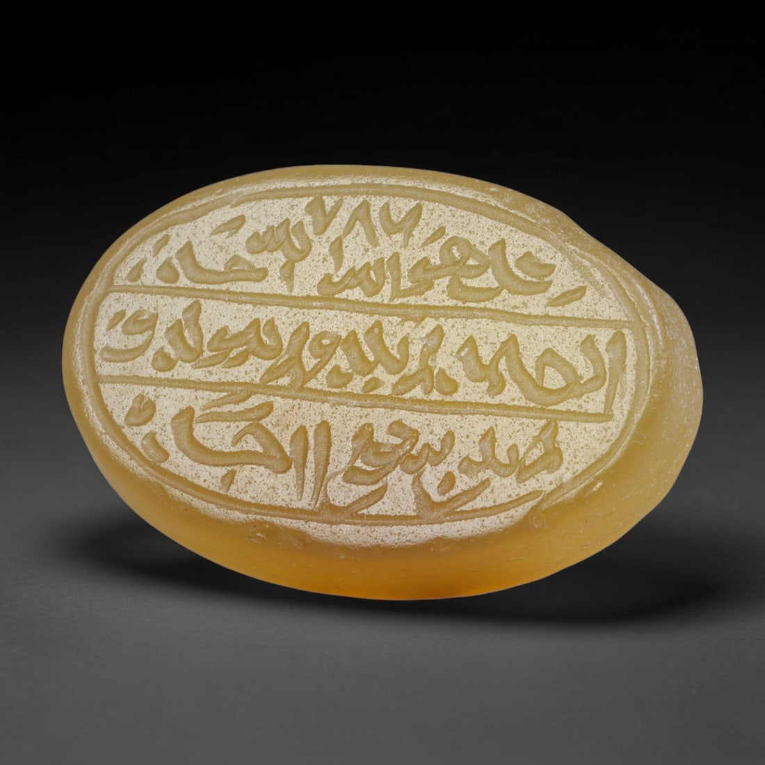 Antique Islamic Qajar / Late Ottoman Agate Calligraphic Talisman Seal (1700-1900 CE), 82FP: Genuine fully hand-carved oval agate seal, entirely crafted by hand without machine tooling, identifiable by organic, uneven hand-cut engraving texture throughout the calligraphic field. The stone bea