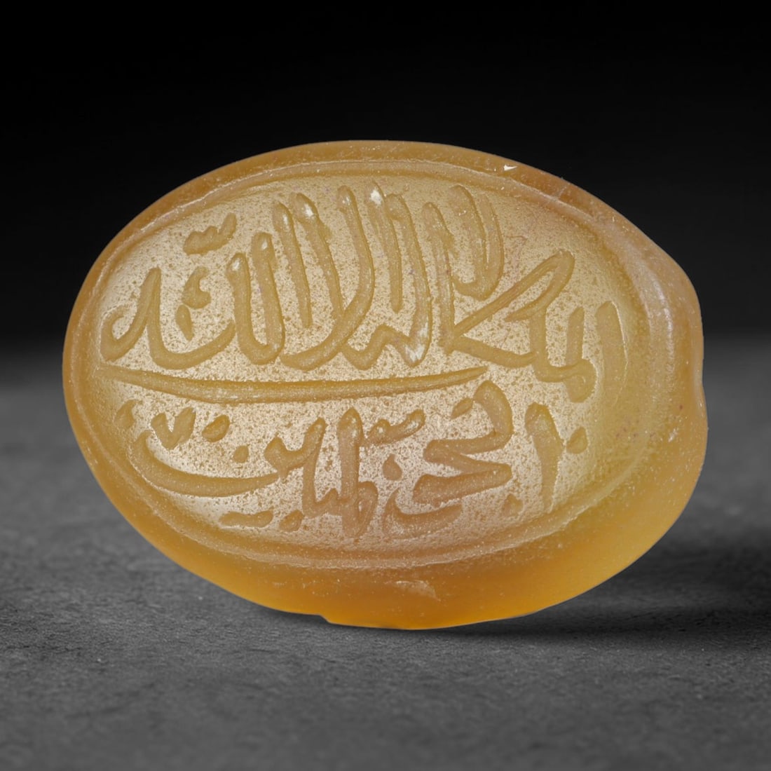 Antique Islamic Qajar / Late Ottoman Agate Calligraphic Talisman Seal (1700-1900 CE), 76FP: Genuine fully hand-carved oval agate seal, entirely crafted by hand without machine tooling, identifiable by organic, uneven hand-cut engraving texture throughout the calligraphic field. The stone bea