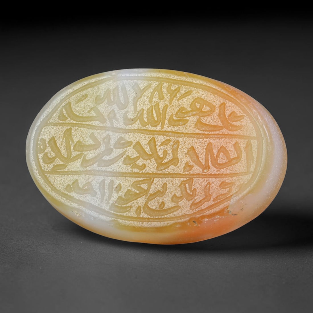 Antique Islamic Qajar / Late Ottoman Agate Calligraphic Talisman Seal (1700-1900 CE), 92FP: Genuine fully hand-carved oval agate seal, entirely crafted by hand without machine tooling, identifiable by organic, uneven hand-cut engraving texture throughout the calligraphic field. The stone bea