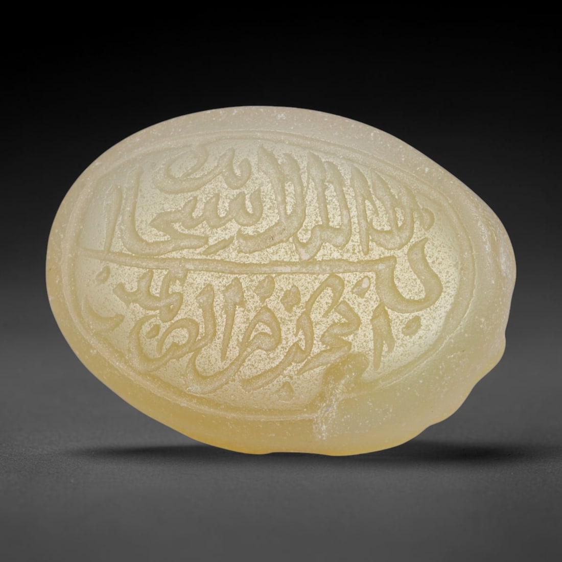 Antique Islamic Qajar / Late Ottoman Agate Calligraphic Talisman Seal (1700-1900 CE), 83FP: Genuine fully hand-carved oval agate seal, entirely crafted by hand without machine tooling, identifiable by organic, uneven hand-cut engraving texture throughout the calligraphic field. The stone bea