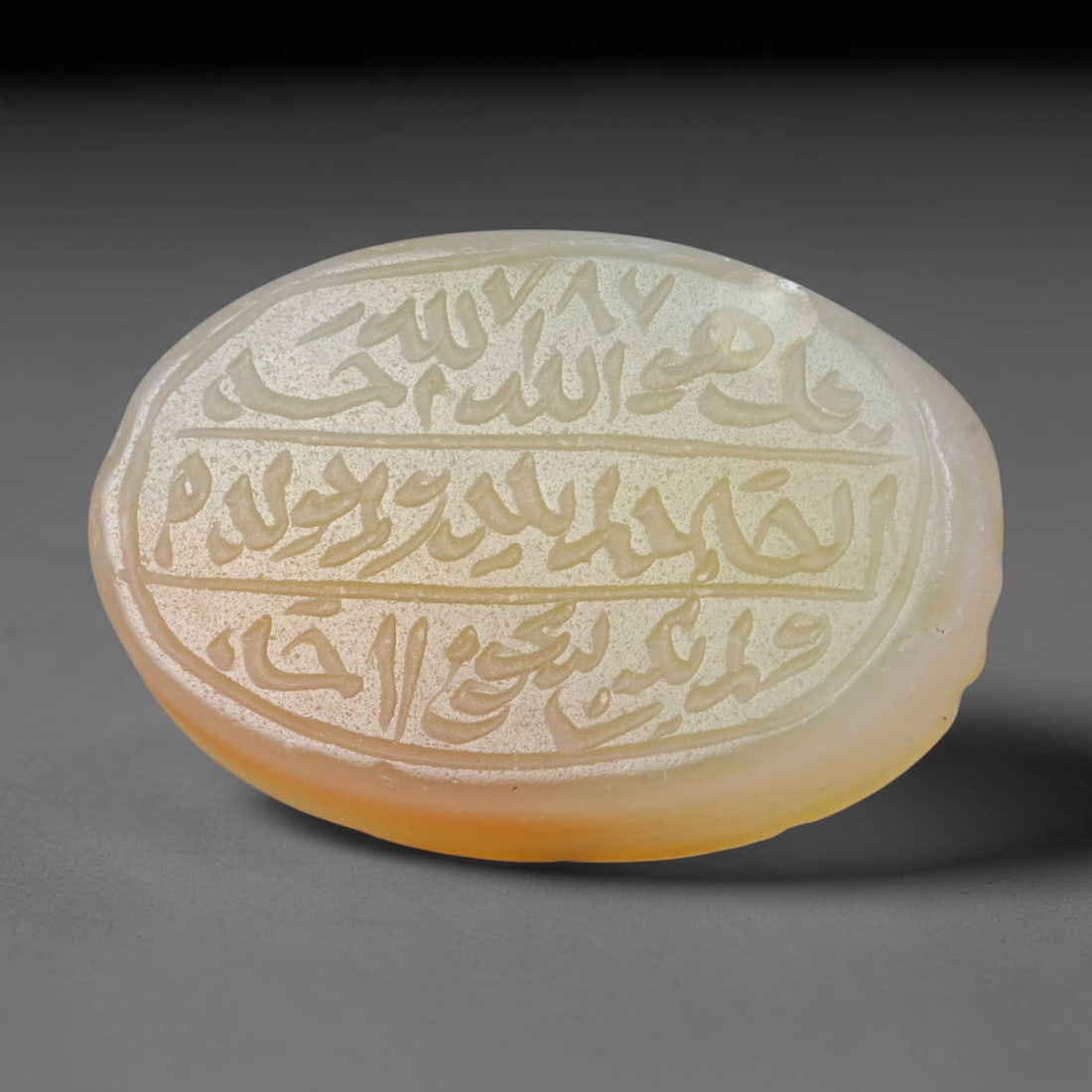 Antique Islamic Qajar / Late Ottoman Agate Calligraphic Talisman Seal (1700-1900 CE), 87FP: Genuine fully hand-carved oval agate seal, entirely crafted by hand without machine tooling, identifiable by organic, uneven hand-cut engraving texture throughout the calligraphic field. The stone bea