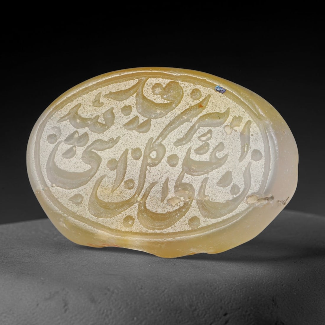 Antique Islamic Qajar / Late Ottoman Agate Calligraphic Talisman Seal (1700-1900 CE), 79FP: Genuine fully hand-carved oval agate seal, entirely crafted by hand without machine tooling, identifiable by organic, uneven hand-cut engraving texture throughout the calligraphic field. The stone bea
