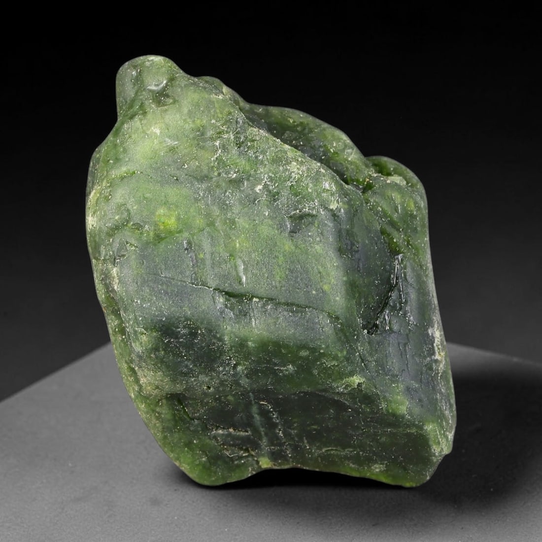 157ct Natural Russian Siberian Deep Forest Green Chrome Diopside Rough, 96AH: This substantial uncut chrome diopside rough features rich saturated forest green color boosted by natural chromium deposits, creating vivid emerald-hued translucency across its textured raw surface, 