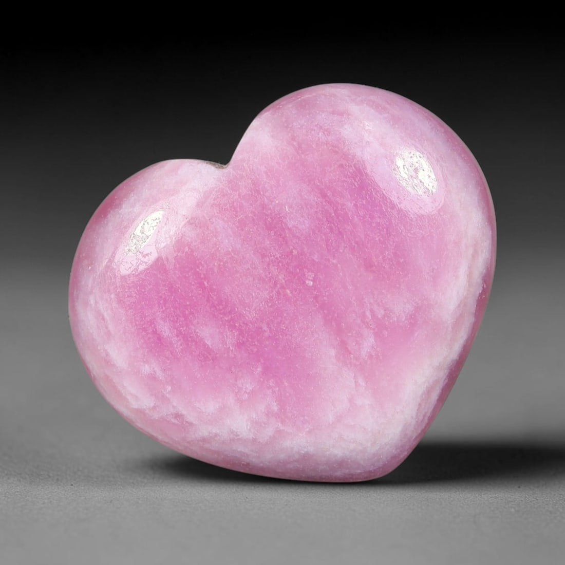 18.87 Carats Natural Mozambique Vivid Pink Red Ruby Loose Gemstone, 89FG: This polished Mozambique ruby cabochon measures 19.4x16.7x5mm, featuring striking natural swirling white mineral banding layered across a rich saturated pink red base that creates a unique organic art