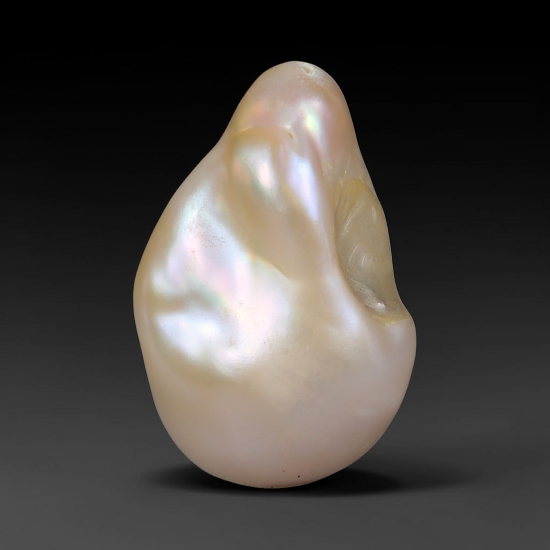 Natural Freshwater Keshi Pearl - Iridescent Baroque Pearl Ornament, 39AE: A natural freshwater keshi pearl with organic asymmetrical baroque shaping, exhibiting soft creamy blush base tones with shifting pastel pink, lavender and pale gold iridescent luster across its smoot