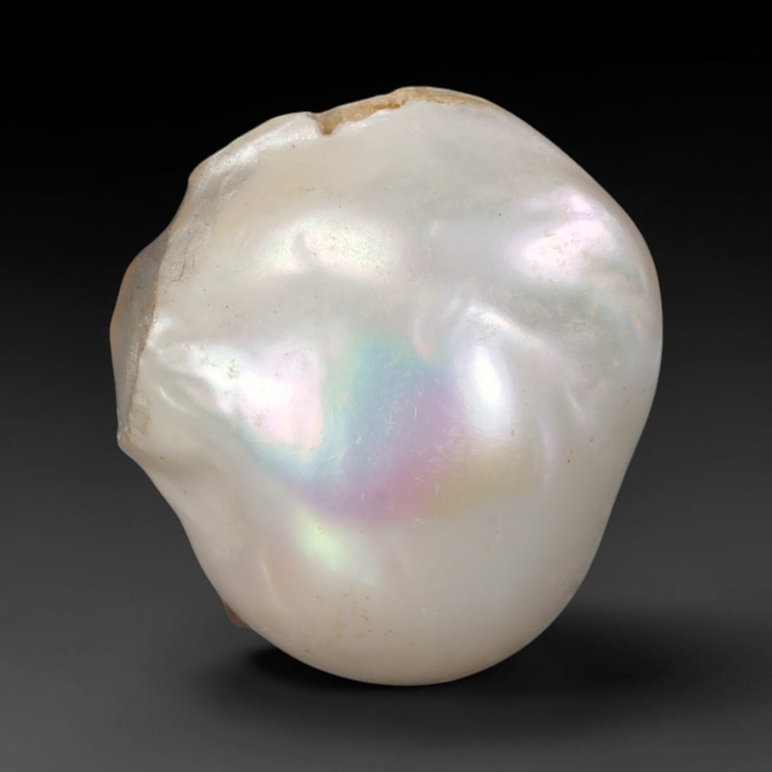 Natural Freshwater Keshi Pearl - Iridescent Baroque Pearl Ornament, 47AE: A natural freshwater keshi pearl with organic asymmetrical baroque shaping, exhibiting soft creamy blush base tones with shifting pastel pink, lavender and pale gold iridescent luster across its smoot