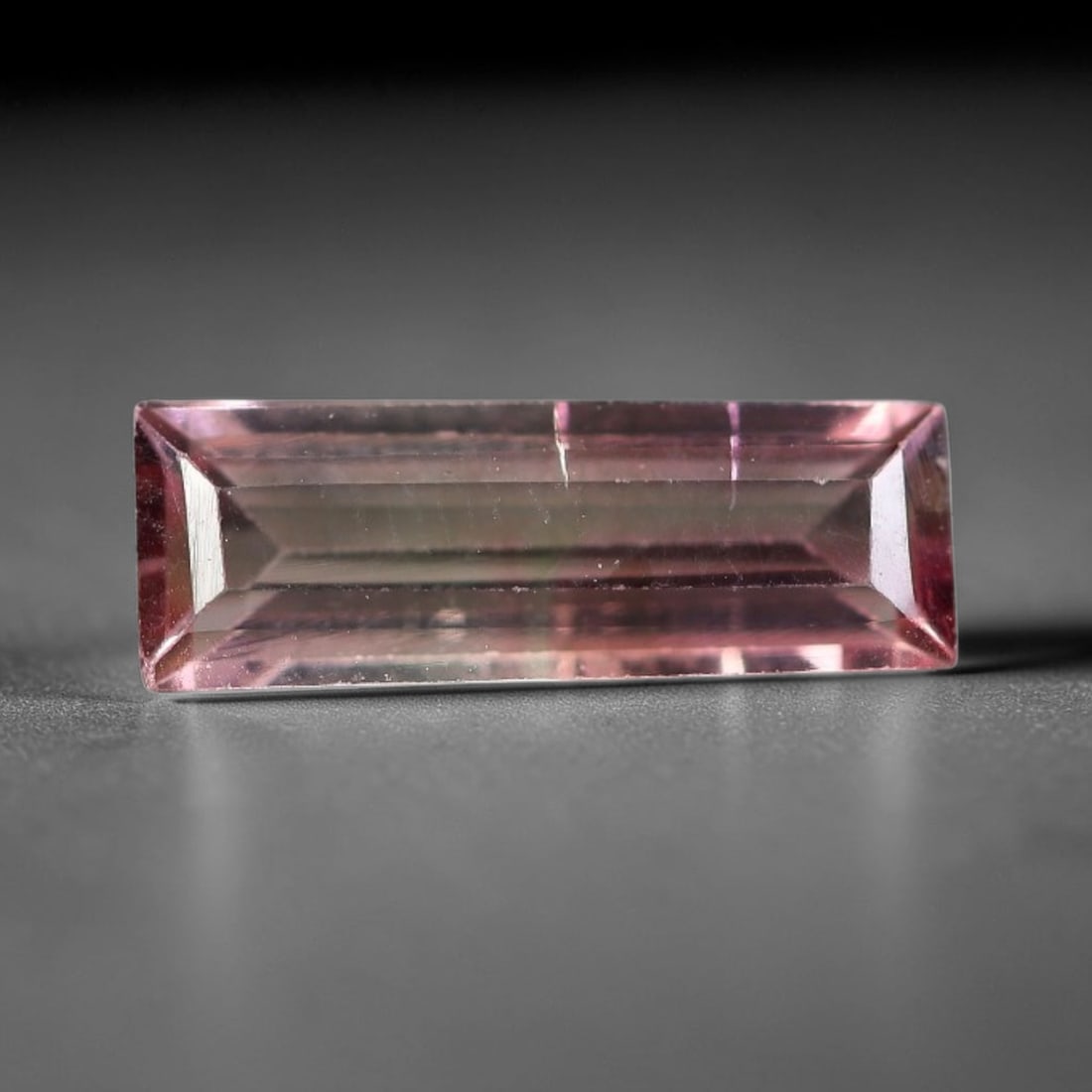 0.98 Carats Natural Mozambique Fancy Color Tourmaline Loose Gemstone, 3FM: This Mozambique fancy color tourmaline carries physical measurements of 10.8x3.8x2.5mm, representing a fine example of collectible fancy tourmaline sourced from established Mozambican mineral deposits