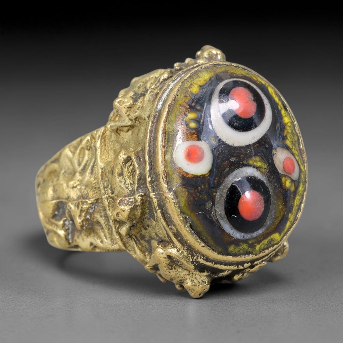 Antique Islamic Millefiori Evil Eye Glass Cabochon Set Vintage Signet Ring (1700-1900 CE), 56AN: The primary collectible value resides within the inset antique millefiori evil-eye glass cabochon, authentic genuine antique glass (distinguished from earlier ancient glass and modern vintage glass) c
