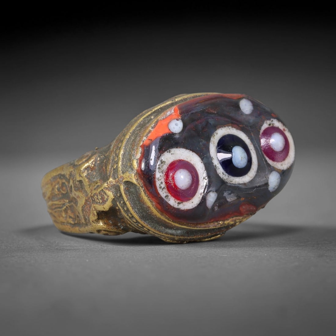 Antique Islamic Millefiori Evil Eye Glass Cabochon Set Vintage Signet Ring (1700-1900 CE), 77FM: The primary collectible value resides within the inset antique millefiori evil-eye glass cabochon, authentic genuine antique glass (distinguished from earlier ancient glass and modern vintage glass) c
