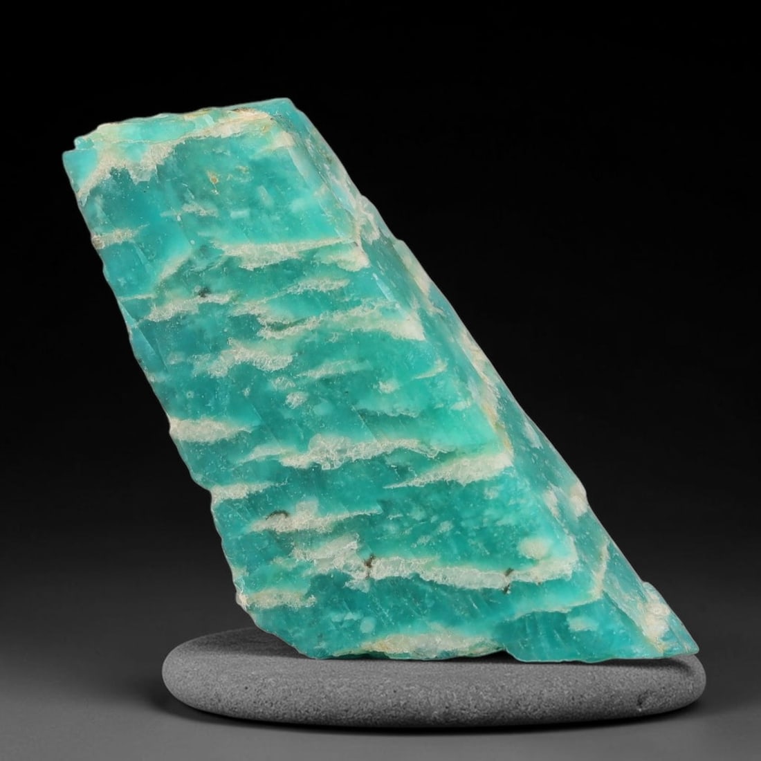40ct Natural Russian Ural Amazonite Slab Rough, 100EB: This intact amazonite slab features distinct parallel mineral banding running uniformly across its naturally split flat surface within 39x16x8mm slab dimensions, retaining unmodified natural geologica