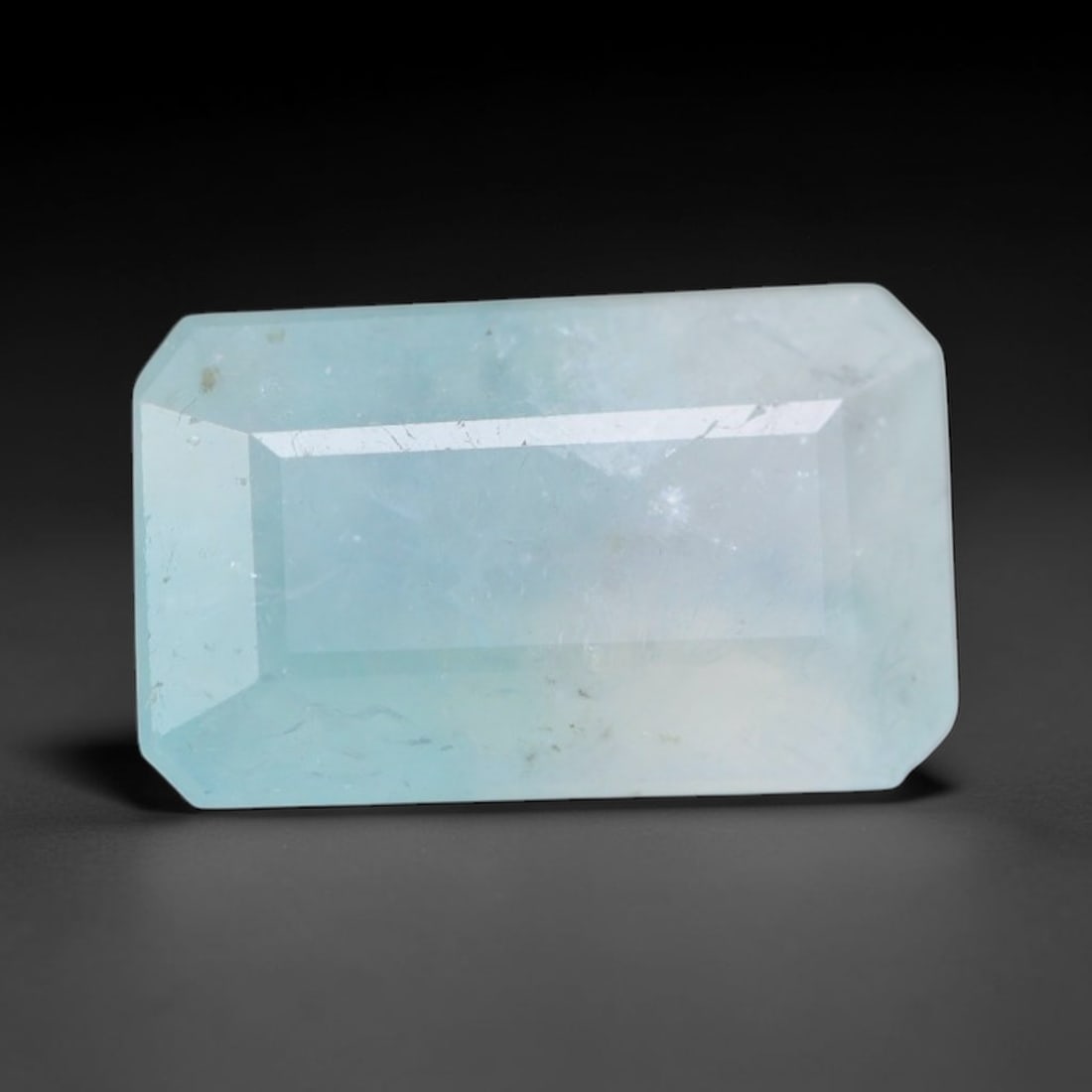 1.94ct Natural Madagascan Faceted Grandidierite Rare Loose Gemstone, 92AS: This expertly faceted finished grandidierite holds soft translucent body tone with fine faint natural internal veining visible beneath precisely cut reflective facets within its 10.3x6.3x3.6mm calibra