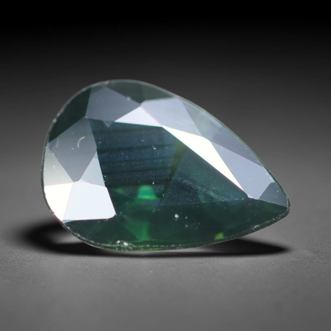 2.67ct Natural Australian Teal Faceted Sapphire Loose Gemstone, 11BA: This skillfully faceted sapphire features rich saturated body tone with fine microscopic mineral inclusions scattered evenly across its polished reflective planes within its 10.8x7.6x4.2mm calibrated 