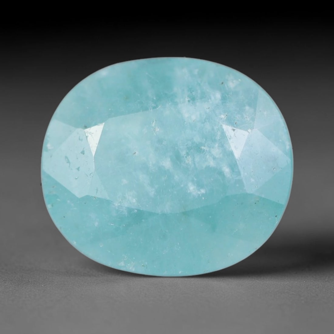 4.49ct Natural Madagascan Faceted Grandidierite Rare Loose Gemstone, 95AS: This expertly faceted finished grandidierite holds soft translucent body tone with fine faint natural internal veining visible beneath precisely cut reflective facets within its 11.1x9.7x6.5mm calibra