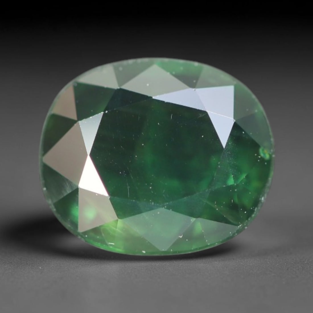 2.30ct Natural Australian Teal Faceted Sapphire Loose Gemstone, 10BA: This skillfully faceted sapphire features rich saturated body tone with fine microscopic mineral inclusions scattered evenly across its polished reflective planes within its 8.5x7.2x3.8mm calibrated d