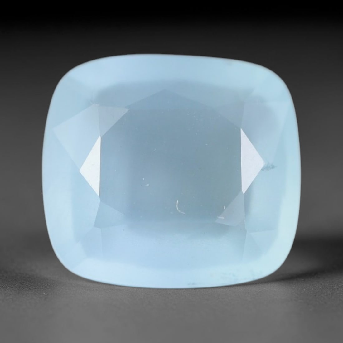 3.02ct Natural Brazilian Soft Sky Blue Faceted Aquamarine Loose Gemstone, 6AS: This expertly faceted aquamarine carries a gentle soft sky blue translucent body with faint fine natural internal mineral markings visible through its polished reflective facets within its 9.9x9x4.8mm