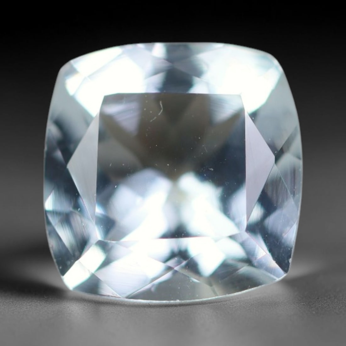 1.78ct Natural Brazilian Sky Blue Faceted Aquamarine Loose Gemstone, 7BC: This precisely faceted aquamarine boasts clear translucent pale sky blue body tone with subtle thin mineral needle and tiny scattered crystalline specks visible within its polished reflective planes i