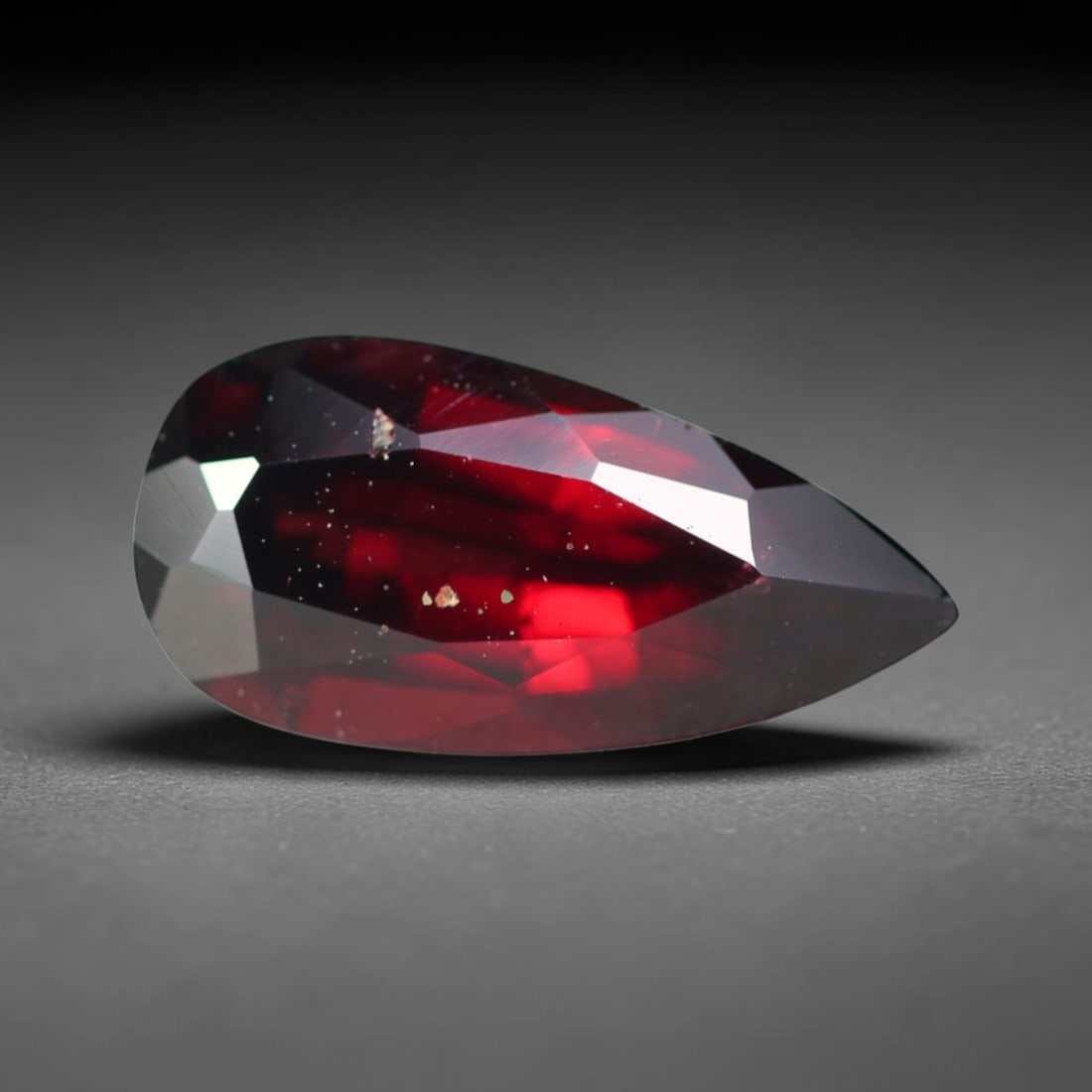 3.71ct Natural Mozambican Deep Crimson Red Faceted Almandine Garnet Loose Gemstone, 69BC: This meticulously faceted garnet features a dense, rich red crystalline body dotted with subtle micro mineral inclusions scattered evenly throughout its transparent interior, precision-cut reflective 